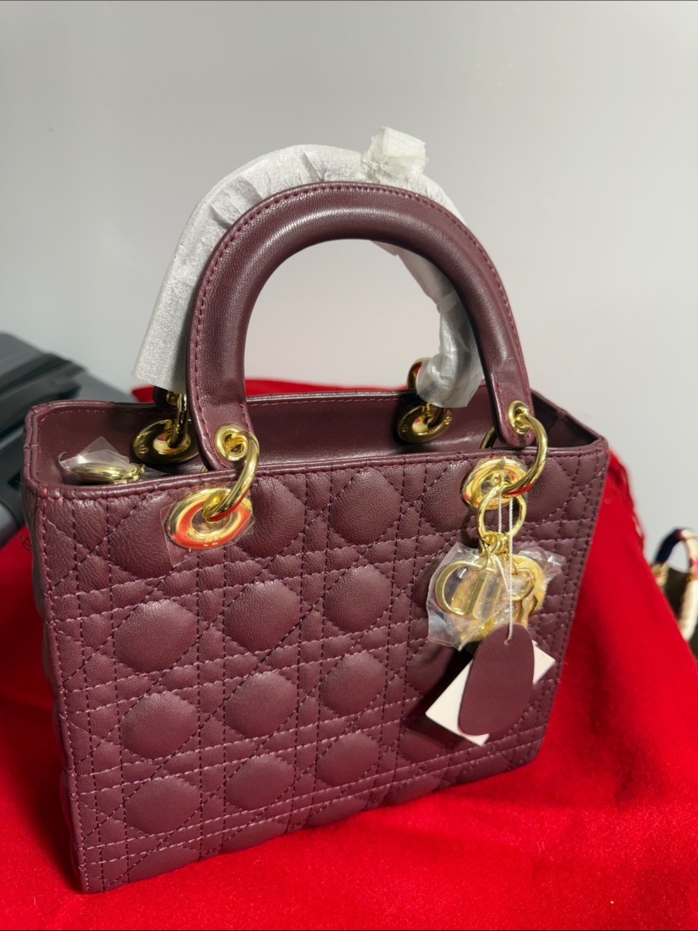 Structured Quilted Leather Top-Handle Bag in Deep Plum